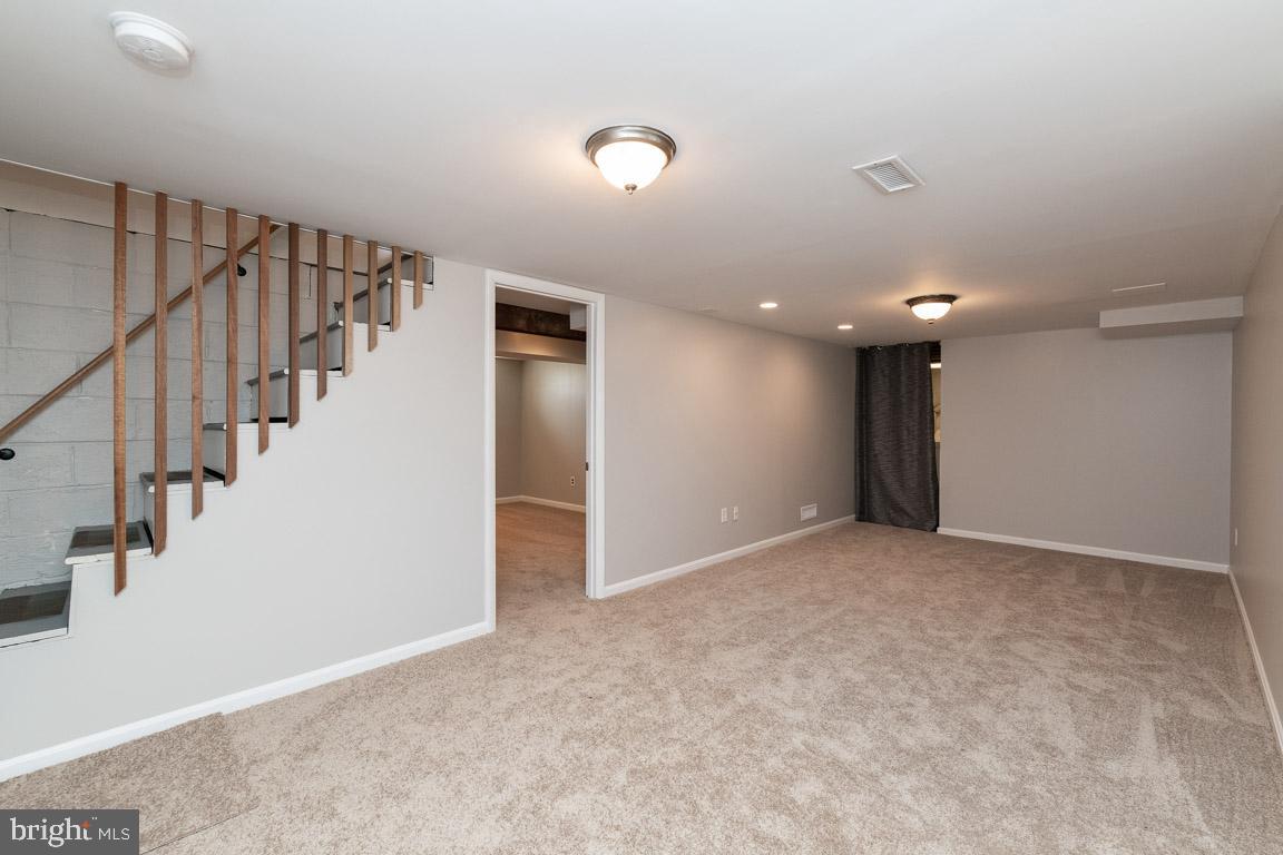 5921 Shady Spring Avenue Rosedale, MD 21237 - Photo 5 of 33 New Carpet in Lower Level Living Space