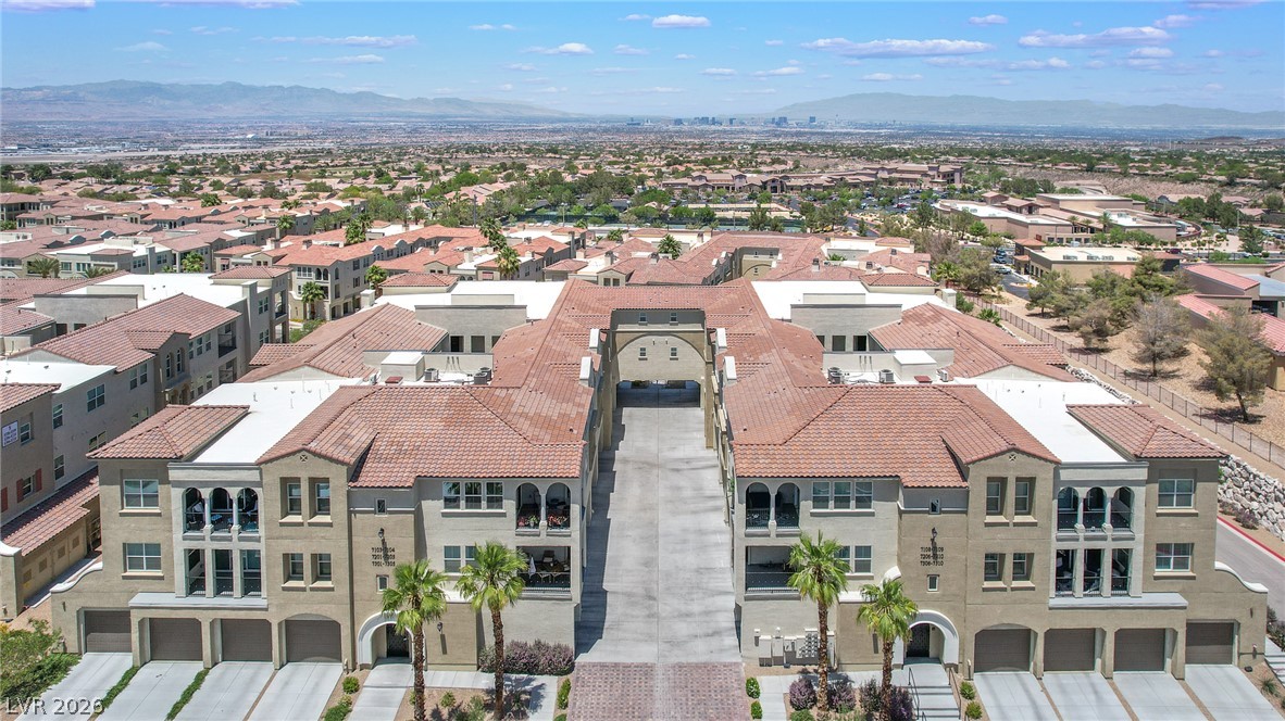 2555 Hampton Road, Unit 7203 Henderson, NV 89052 - Photo 7 of 46 Terra Bella - a gated 55+ Condominium community. Mediterranean inspired architecture, buildings are 3 story with elevator access.