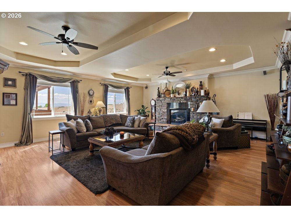 500 St Hilaire Road Yakima, WA 98901 - Photo 3 of 29 a living room with furniture kitchen view and a chandelier