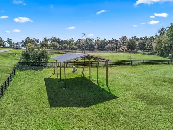 a view of a golf course with a garden