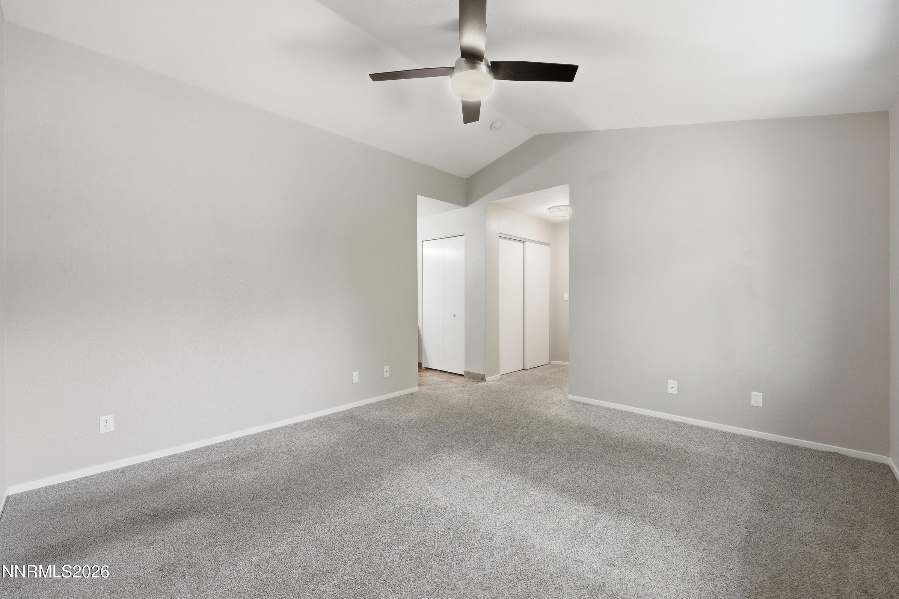 1899 Tuolumne Drive Reno, NV 89523 - Photo 20 of 44 a view of an empty room with a chandelier fan
