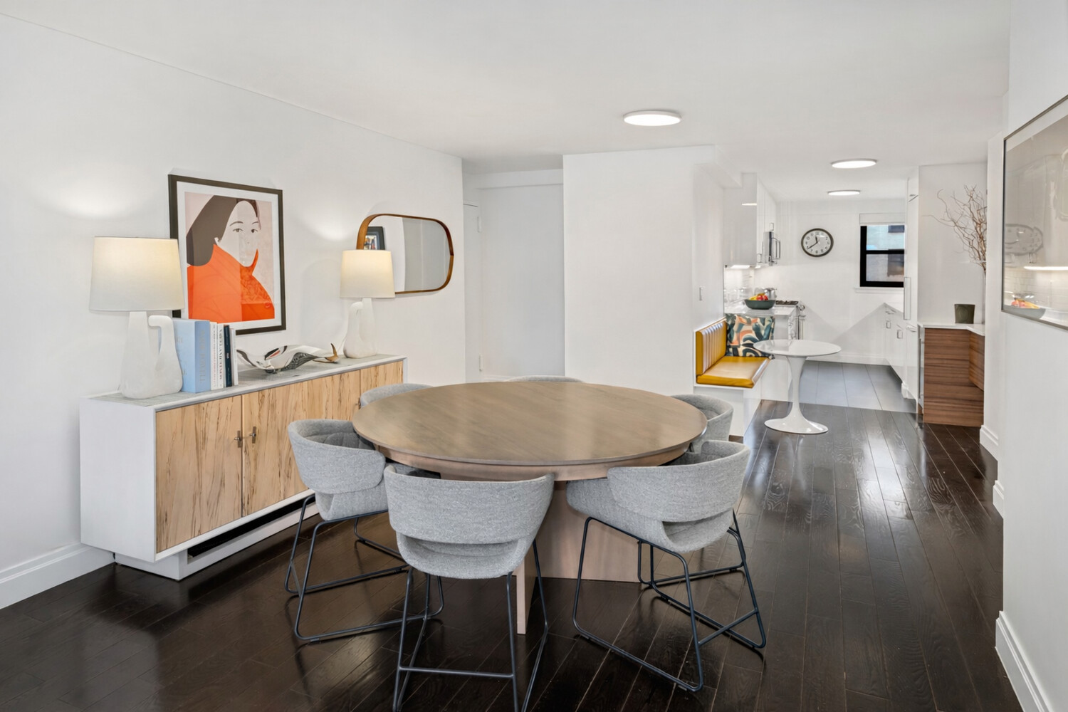 196 East 75th Street, Unit 9A Manhattan, NY 10021 - Photo 2 of 10 a living room with dining table and wooden floor