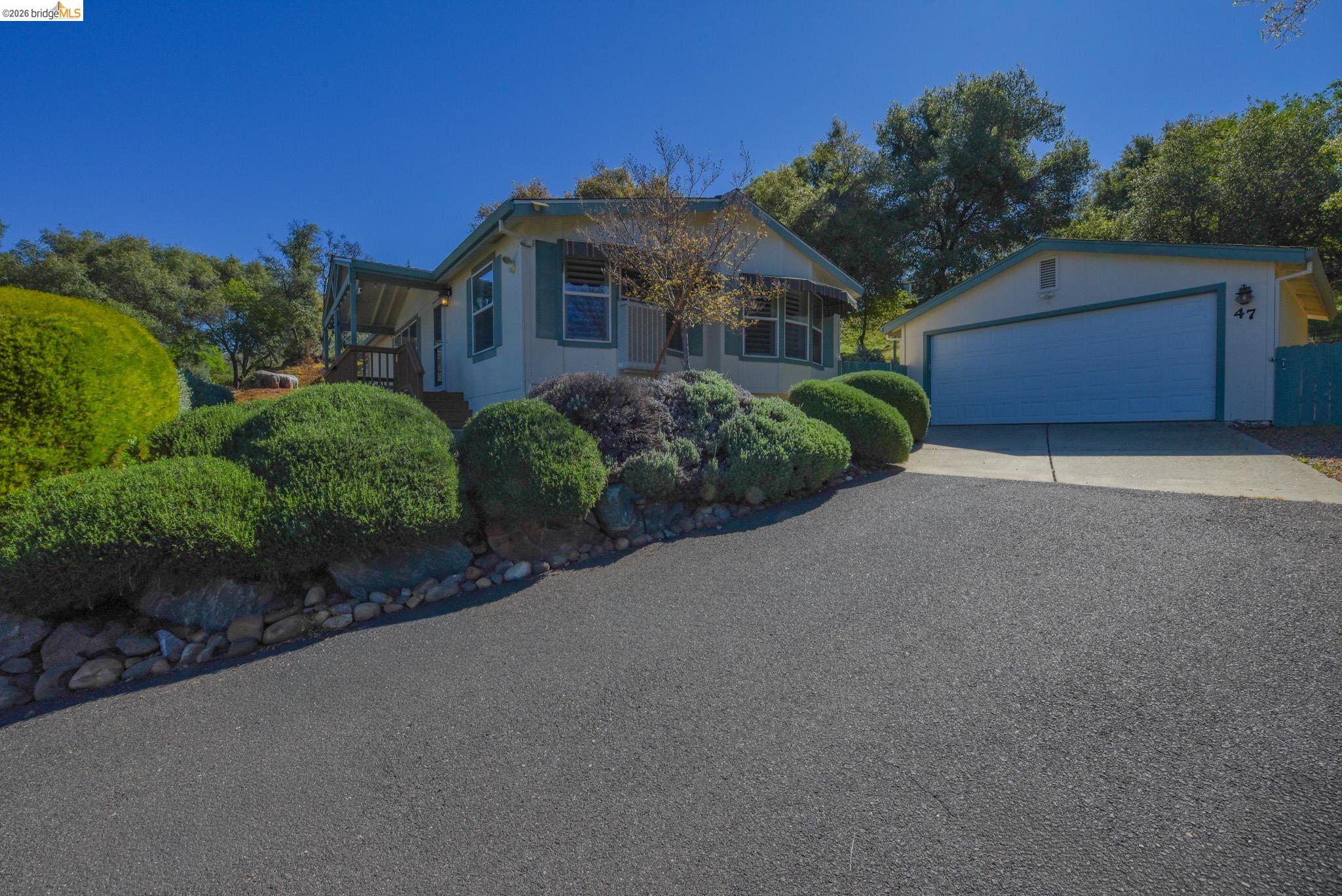 23732 Parrotts Ferry Road, Unit 47 Columbia, CA 95310 - Photo 2 of 21 View of front of property featuring stucco siding
