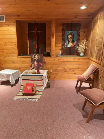 a view of a chair and table in the balcony
