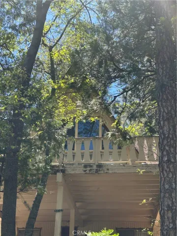 a view of a house with a swimming pool