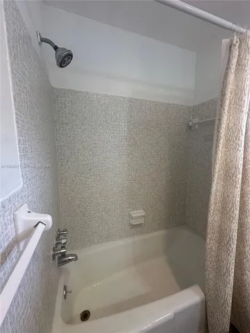 a bathroom with a bathtub