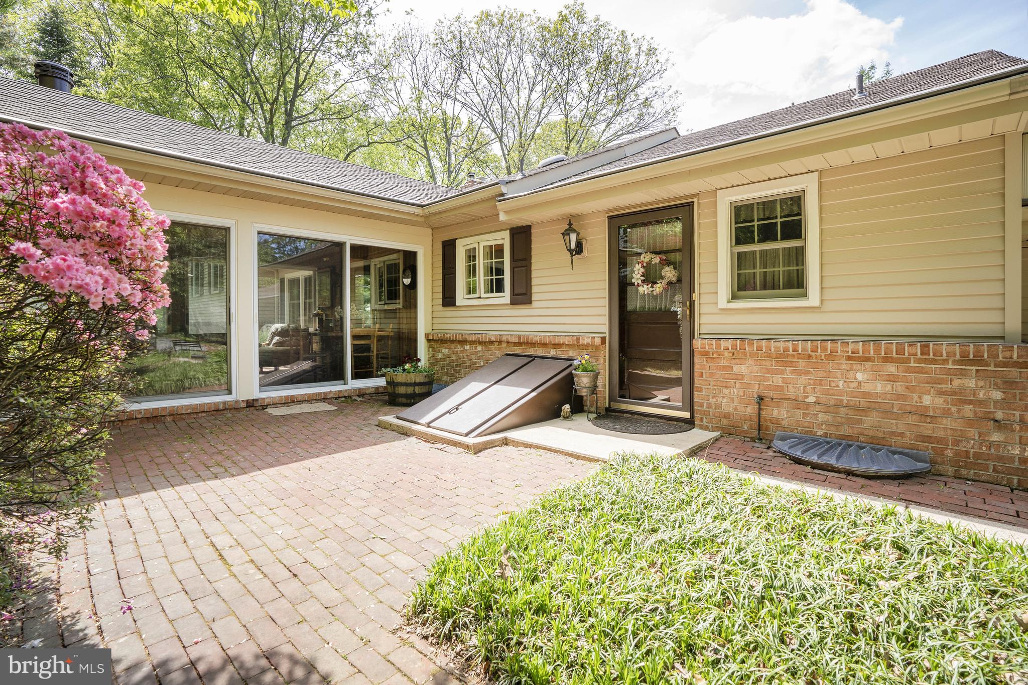 5802 Pyles Ford Road Greenville, DE 19807 - Photo 35 of 40 Brick Leading to Sunroom & Rear Entry Door