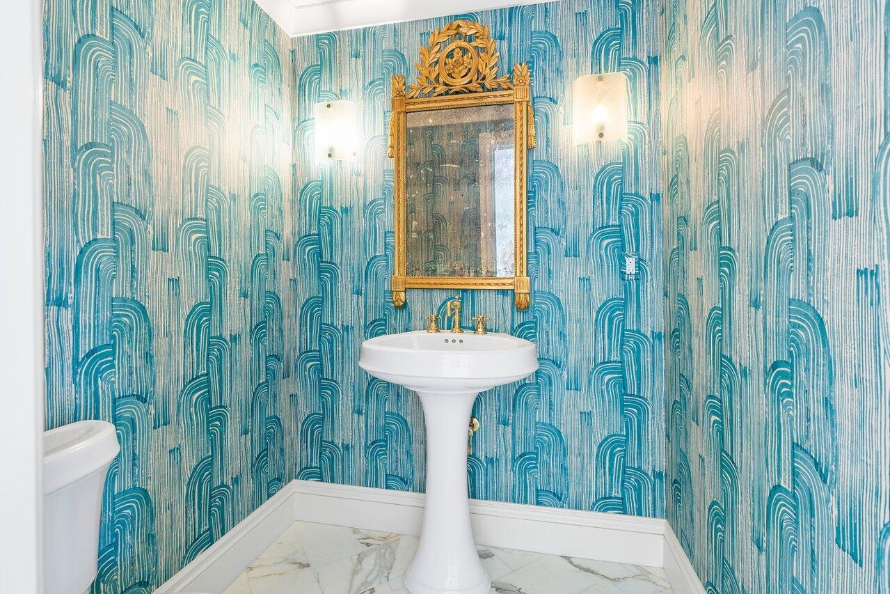 168 Kings Road Palm Beach, FL 33480 - Photo 13 of 49 a bathroom with a sink a toilet and shower