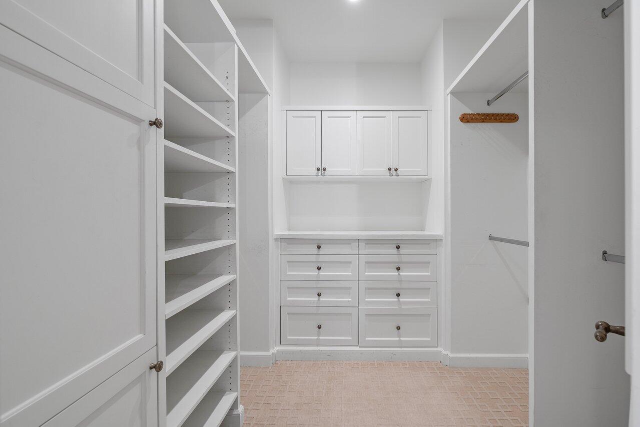 168 Kings Road Palm Beach, FL 33480 - Photo 32 of 49 a view of an empty walk in closet