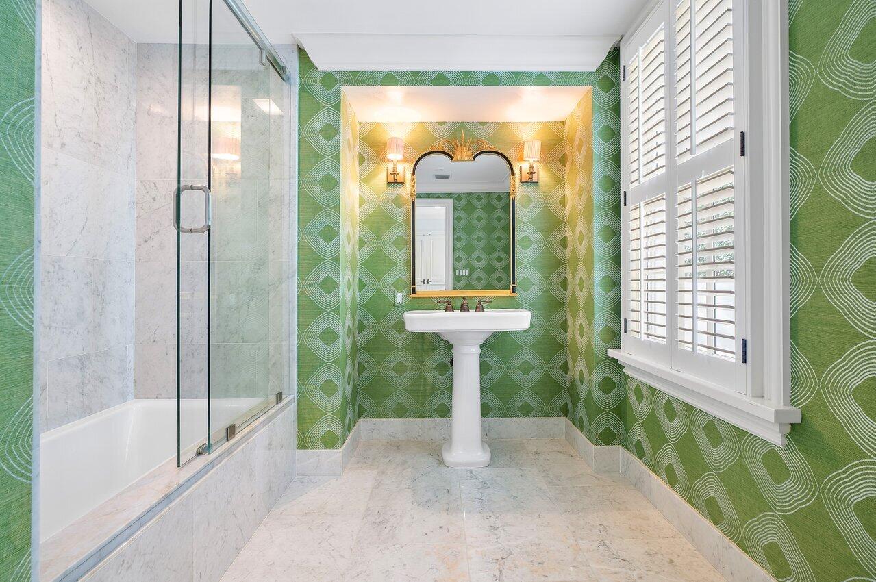 168 Kings Road Palm Beach, FL 33480 - Photo 36 of 49 a view of a bathroom with a tub and a shower