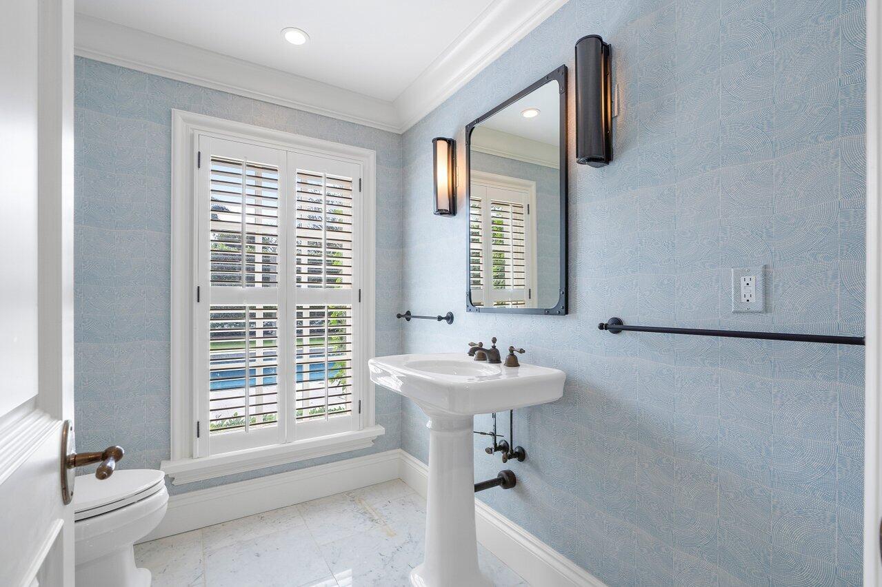 168 Kings Road Palm Beach, FL 33480 - Photo 38 of 49 a bathroom with a sink toilet tub and shower