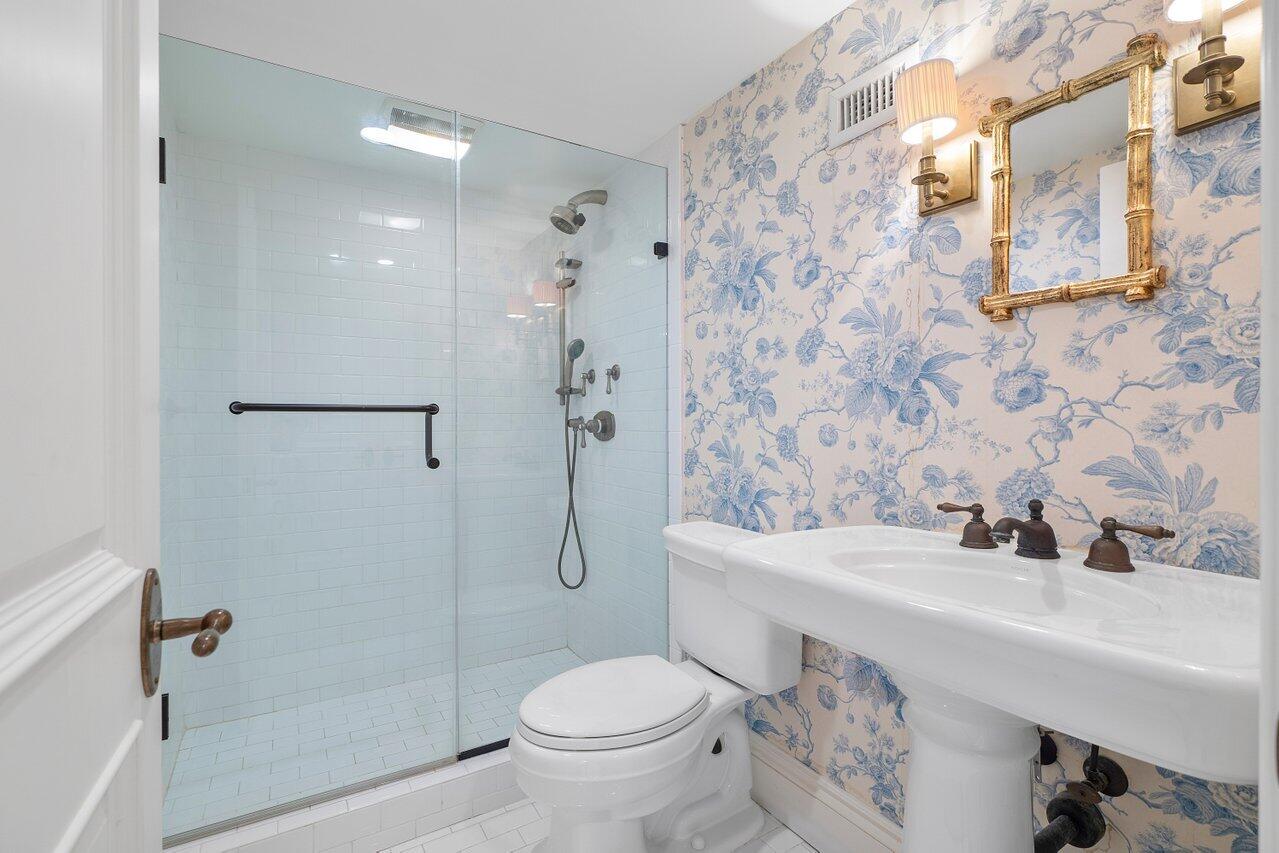168 Kings Road Palm Beach, FL 33480 - Photo 41 of 49 a bathroom with a sink toilet and shower