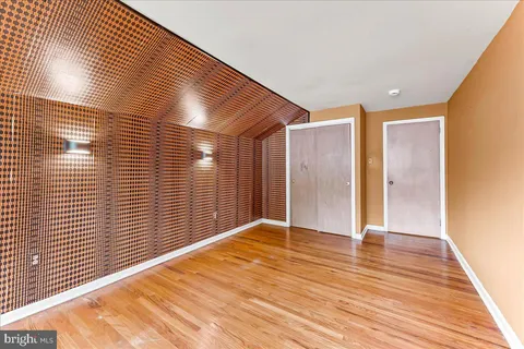 a bathroom with a sink a toilet and shower curtain