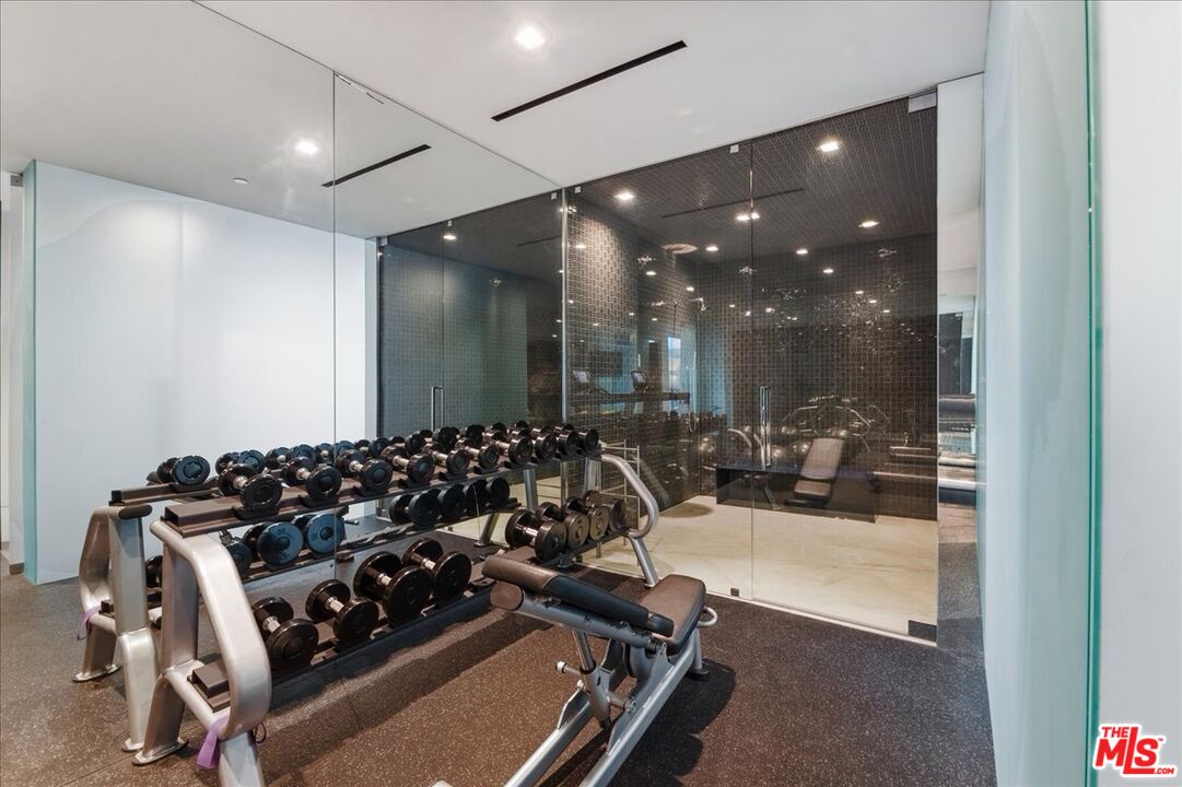 1620 Carla Ridge Beverly Hills, CA 90210 - Photo 35 of 42 a room with gym equipment
