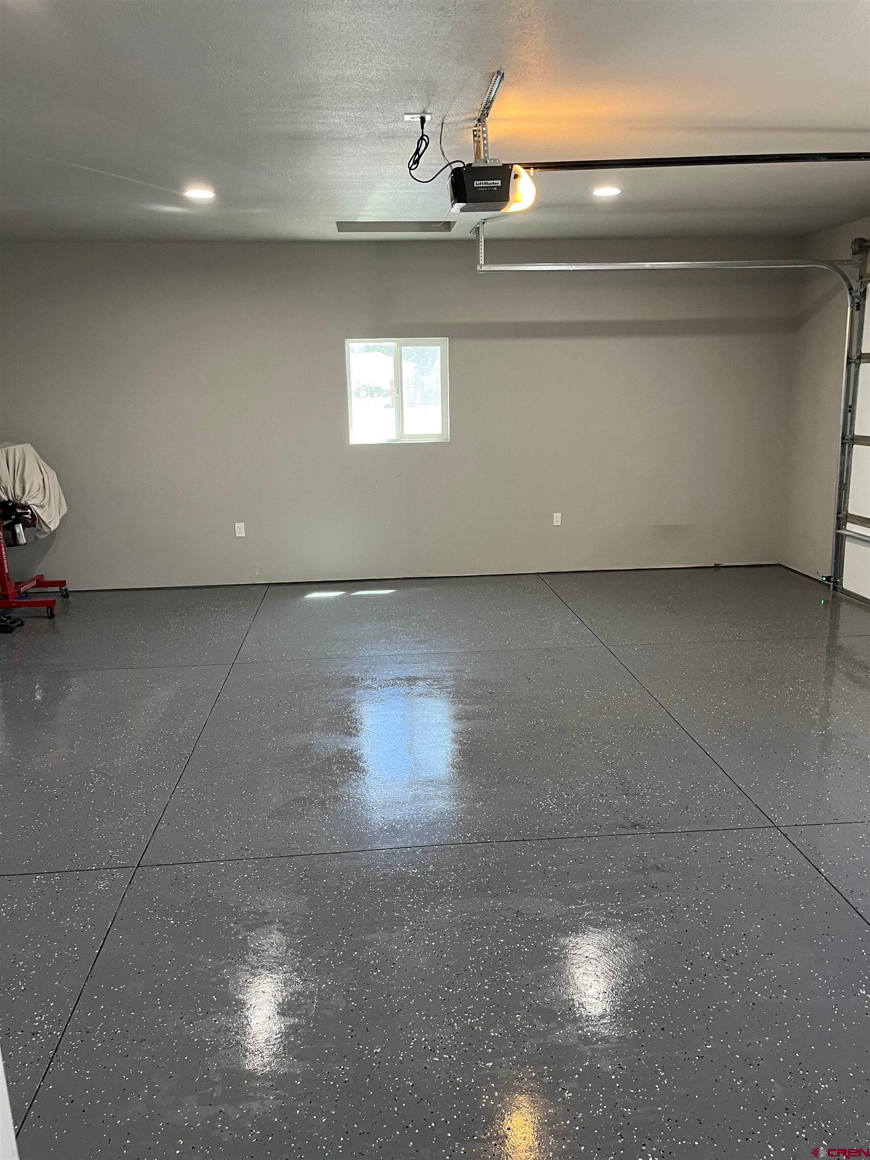 62069 Jade Road Montrose, CO 81401 - Photo 21 of 29 a view of a livingroom with an empty space and a window