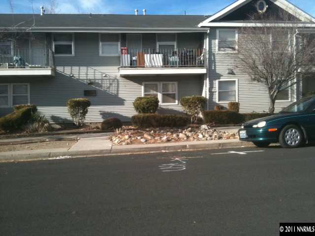 a front view of a house with yard