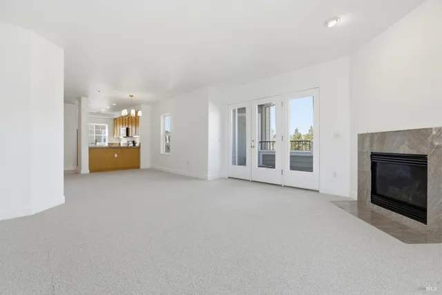 a view of a livingroom with a fireplace