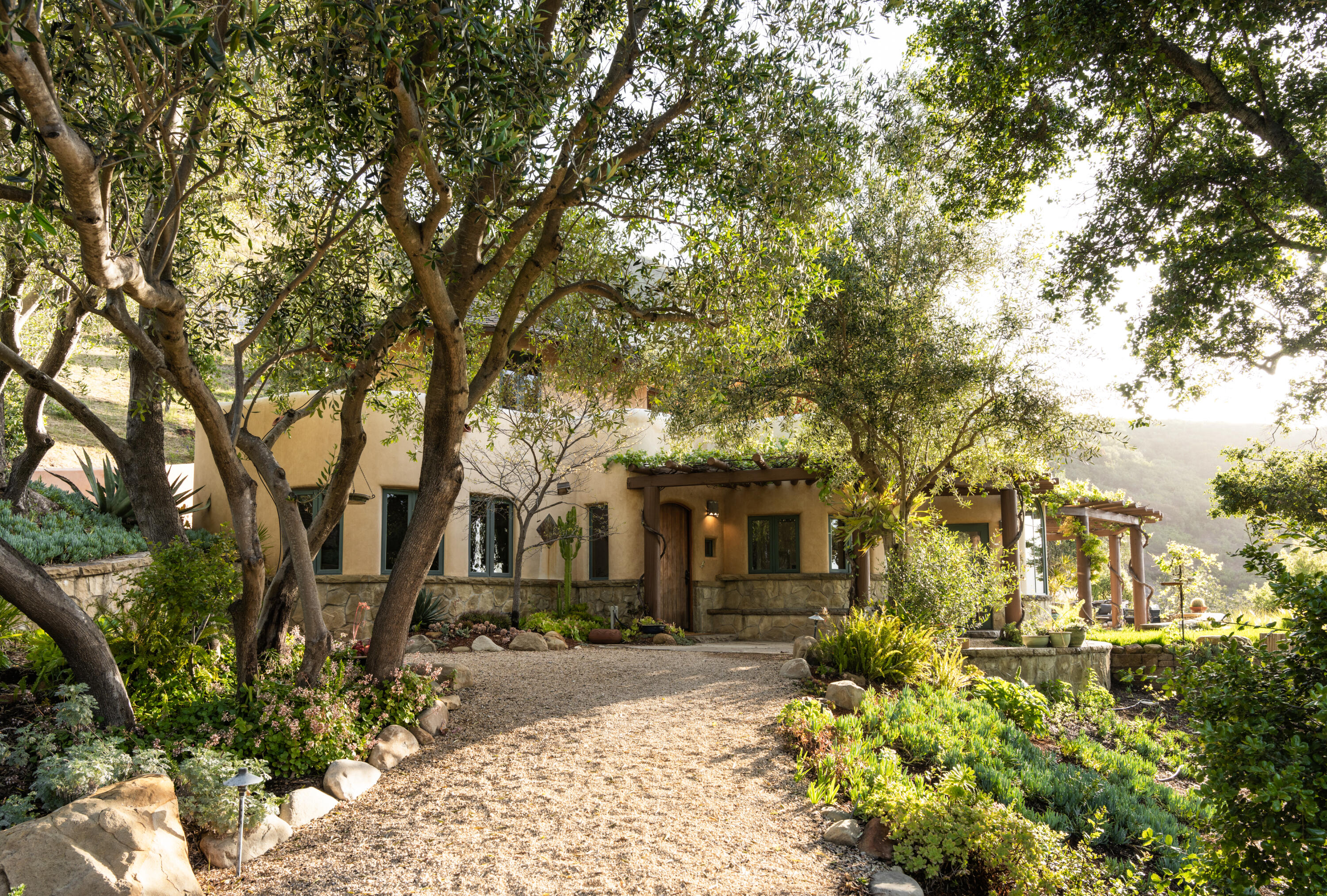 1480 Mission Canyon Road Santa Barbara, CA 93105 - Photo 1 of 38 a front view of a house with a yard
