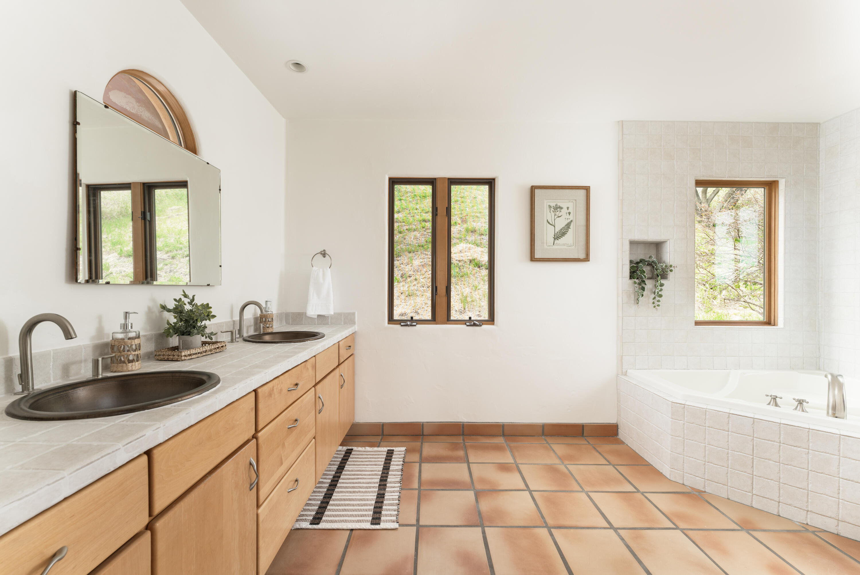 1480 Mission Canyon Road Santa Barbara, CA 93105 - Photo 15 of 38 a bathroom with a sink a bathtub and a window