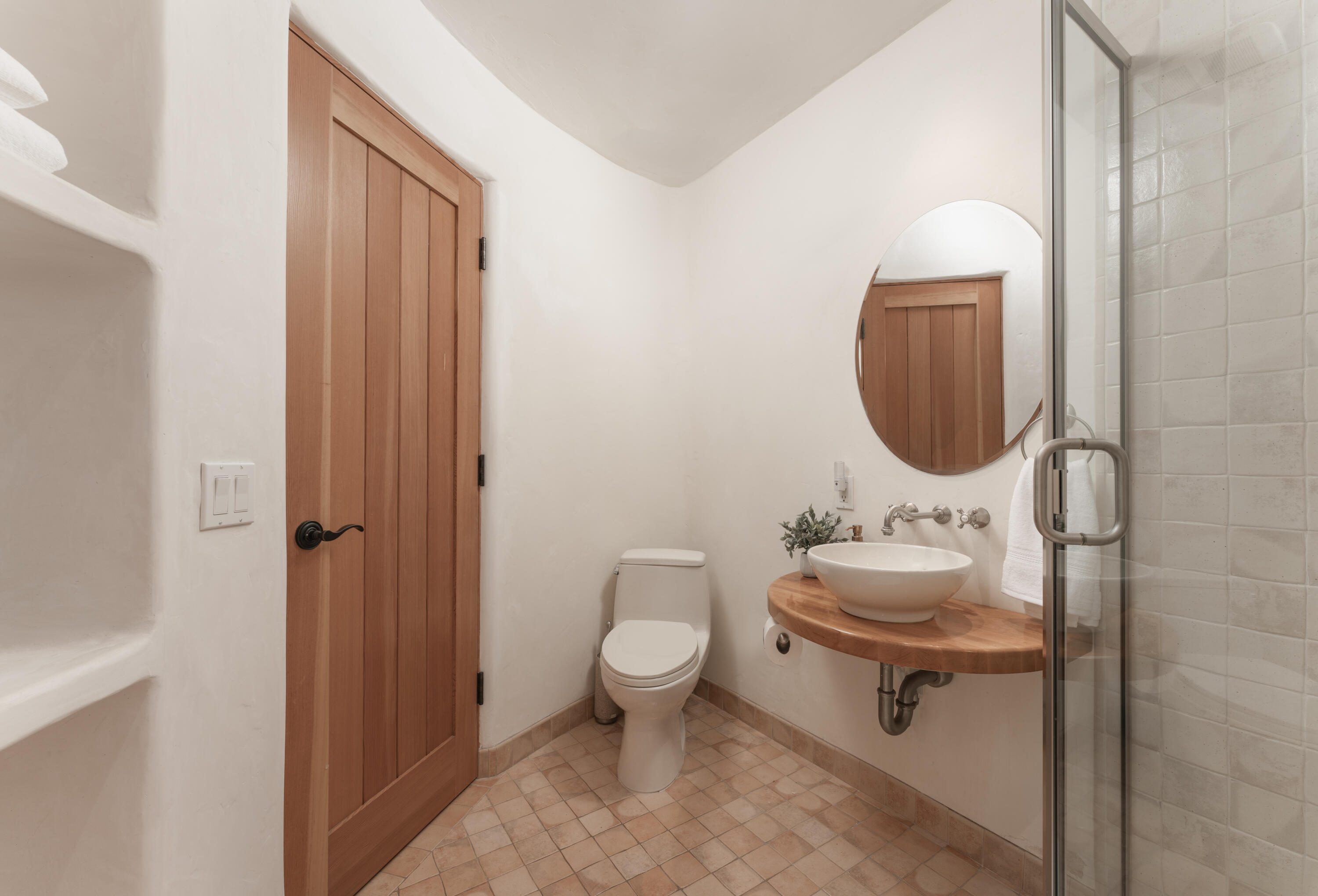 1480 Mission Canyon Road Santa Barbara, CA 93105 - Photo 23 of 38 a bathroom with a toilet sink and mirror