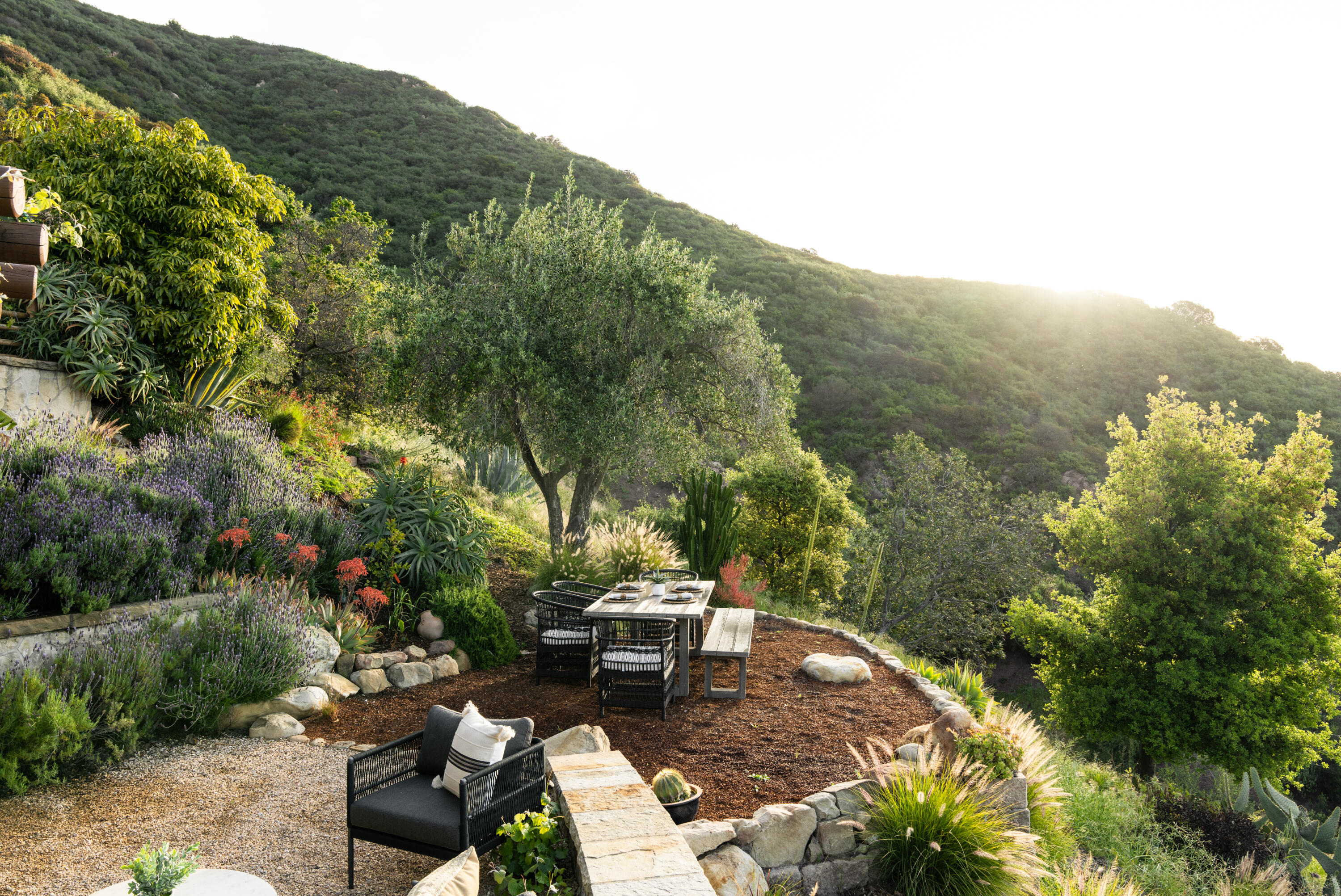 1480 Mission Canyon Road Santa Barbara, CA 93105 - Photo 25 of 38 a view of a backyard with couches chair and a table