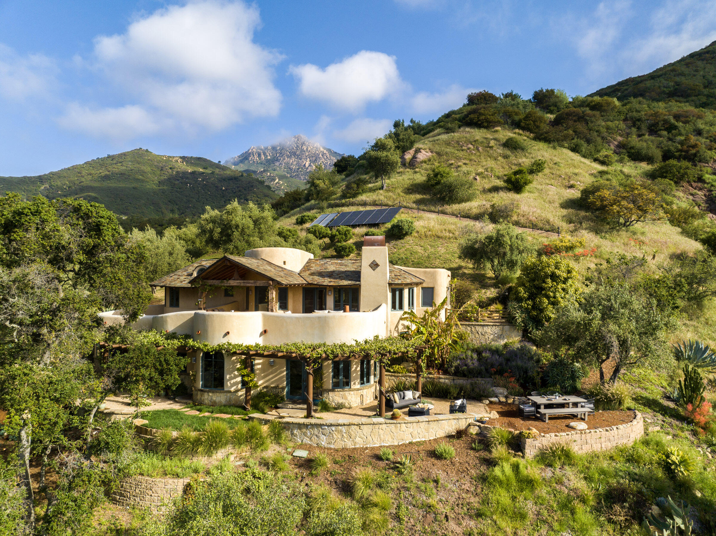1480 Mission Canyon Road Santa Barbara, CA 93105 - Photo 5 of 38 a view of a big yard with plants and palm trees