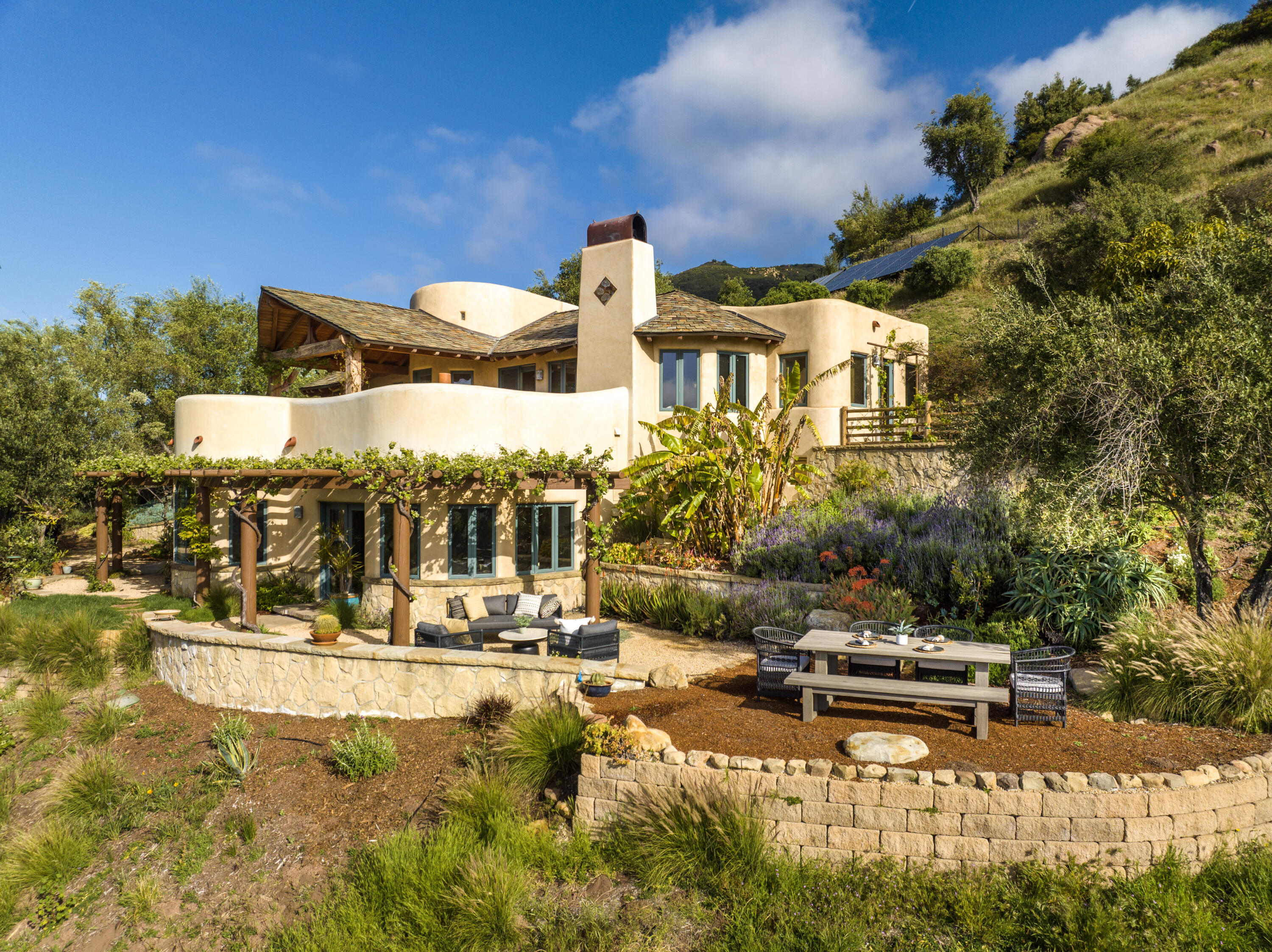 1480 Mission Canyon Road Santa Barbara, CA 93105 - Photo 6 of 38 a view of a building with a yard