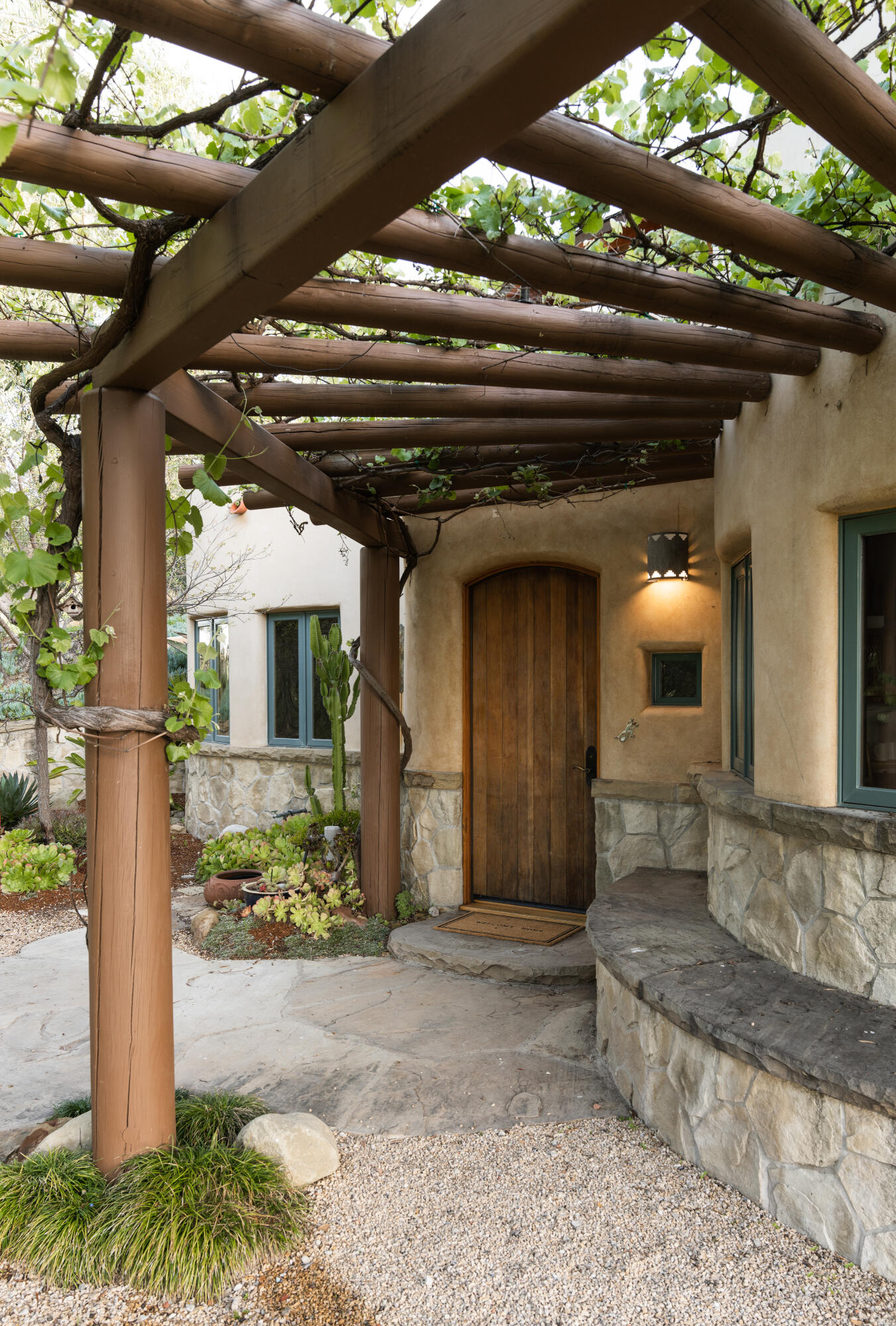 1480 Mission Canyon Road Santa Barbara, CA 93105 - Photo 8 of 38 a front view of a house with a yard