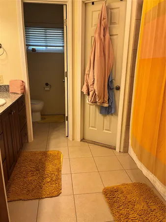 a bathroom with a toilet and a sink