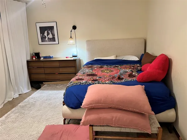 a bathroom with a sink and a shower