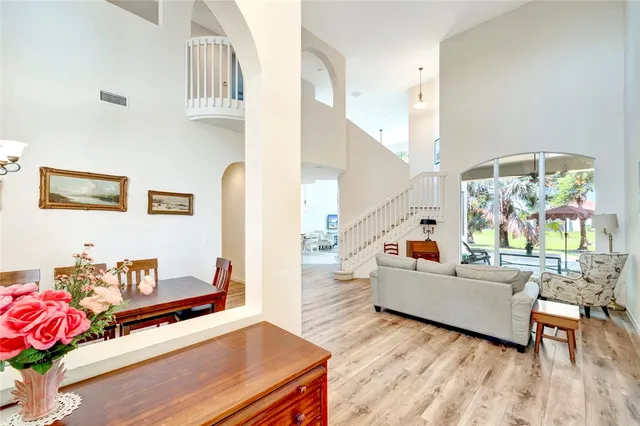 a living room with furniture and a table