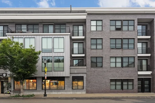 a front view of a building with street