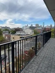 a view of a balcony with an outdoor space