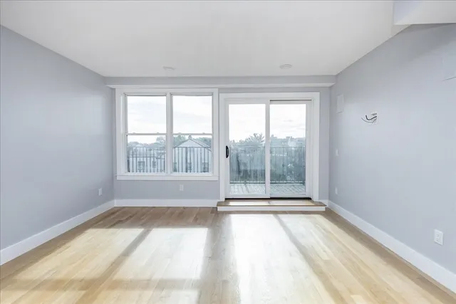 a view of an empty room and window