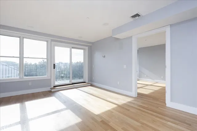 a view of kitchen with wooden floor