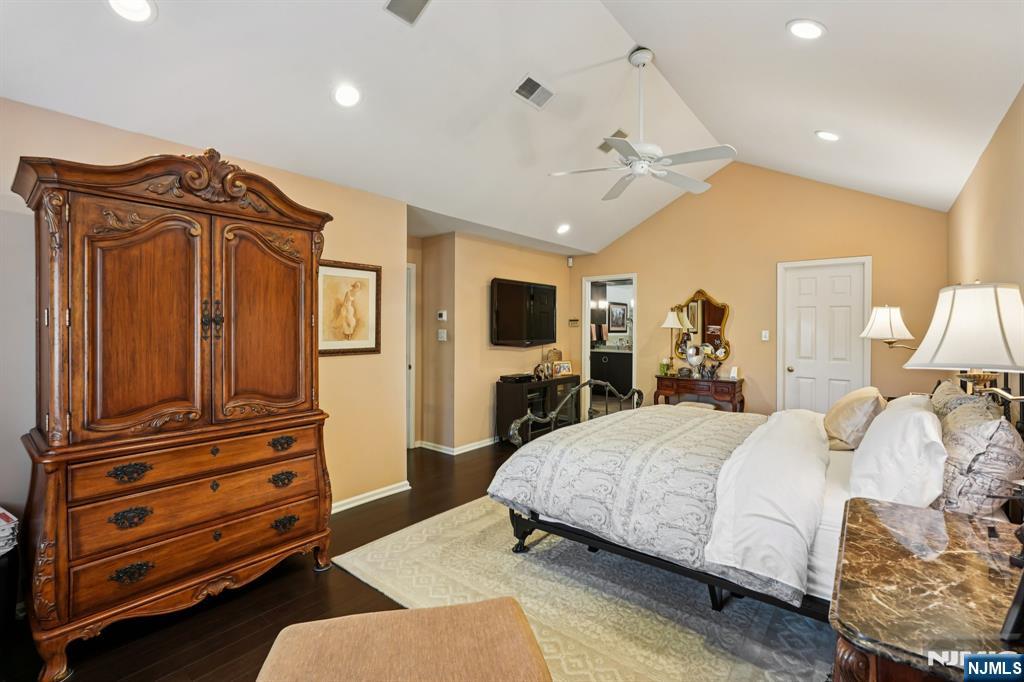 12 Hadley Lane Wayne, NJ 07470 - Photo 20 of 36 a bedroom with a bed and a television