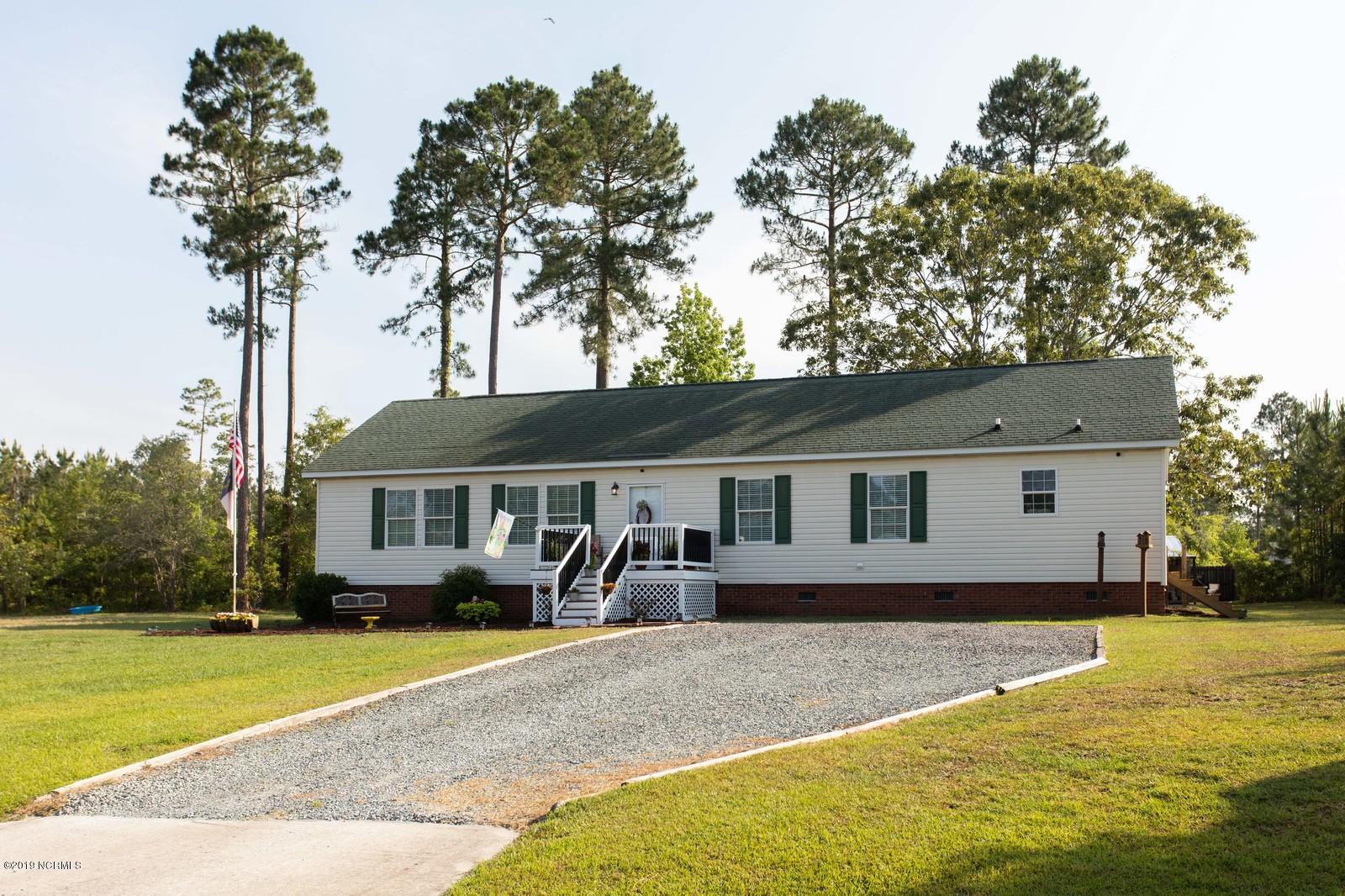 711 Ridgecrest Lane Rocky Point, NC 28457 - Photo 1 of 37 01_711RidgecrestLane1_mls