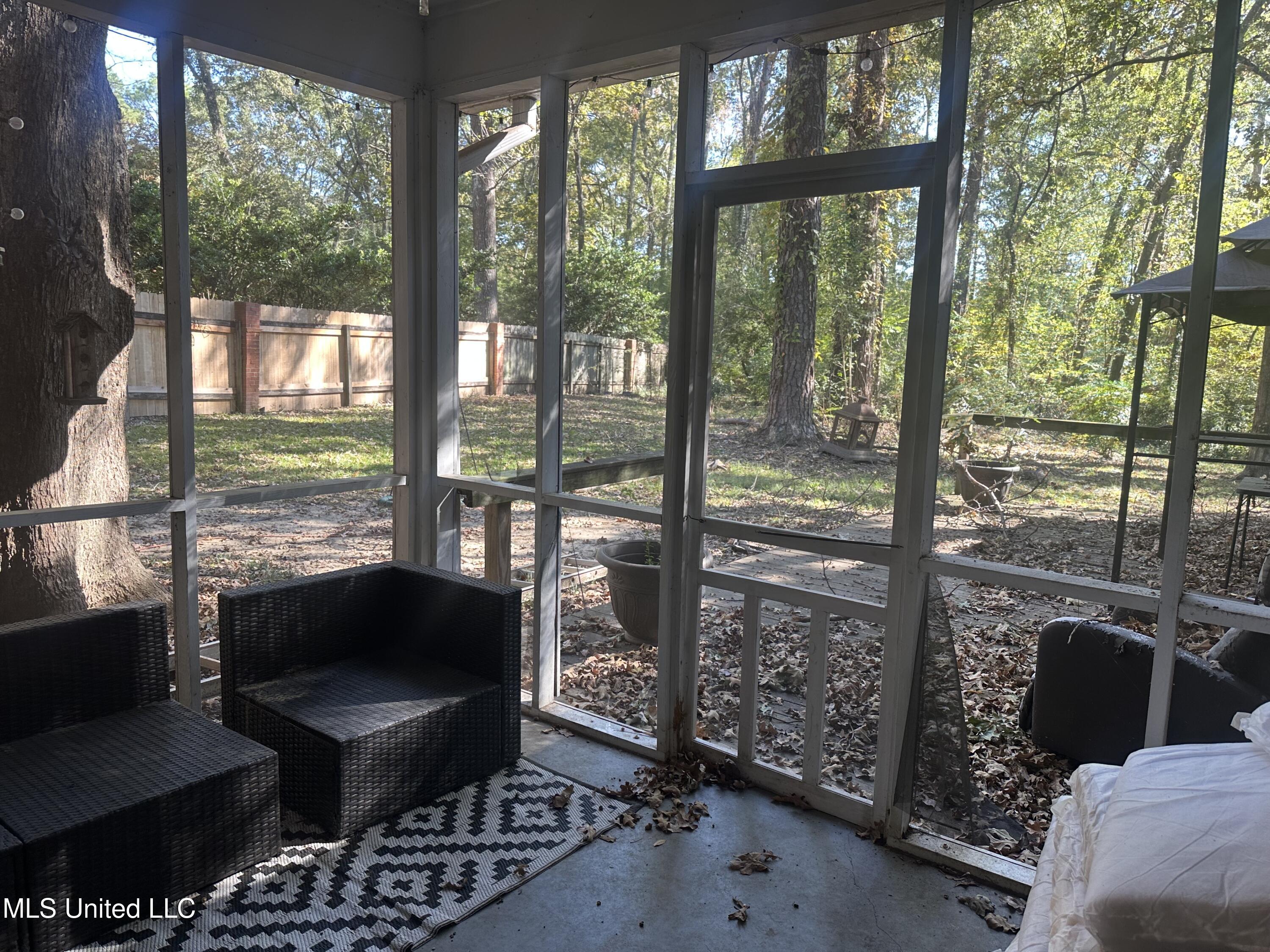 43 South Crownpointe Drive Jackson, MS 39211 - Photo 12 of 12 Screened porch