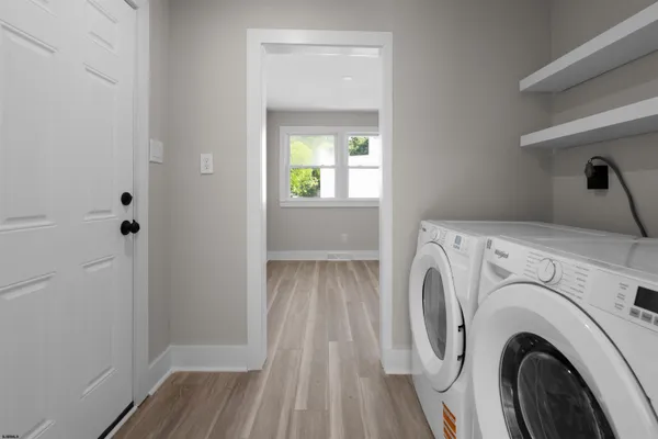 a utility room with dryer and washer