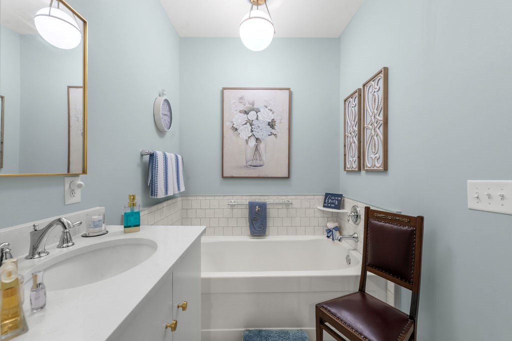 1201 Front Avenue, Unit 322 Columbus, GA 31901 - Photo 35 of 54 a bathroom with a sink and a bathtub