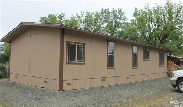 a white house with a outdoor space