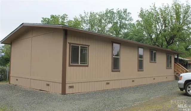 a white house with a outdoor space