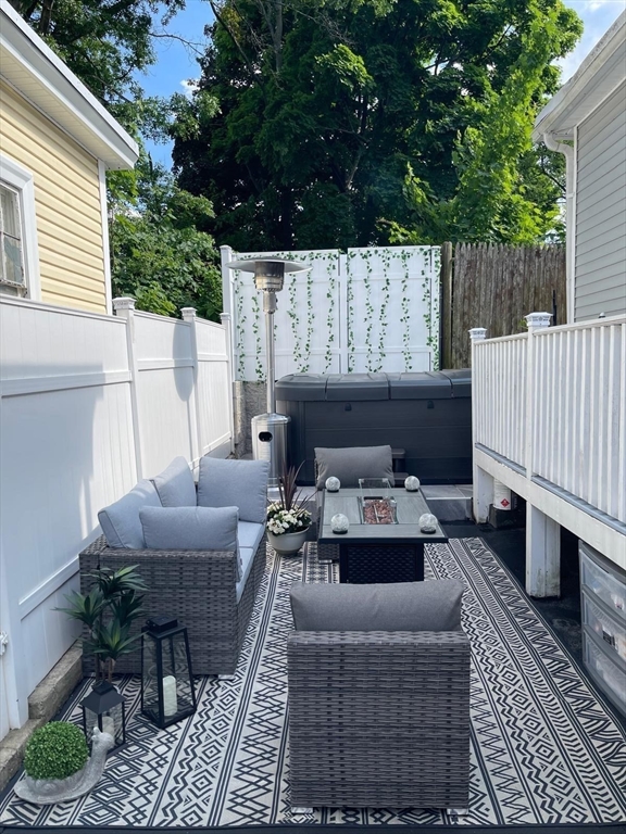 42 D Street Lowell, MA 01851 - Photo 4 of 27 a view of patio with furniture