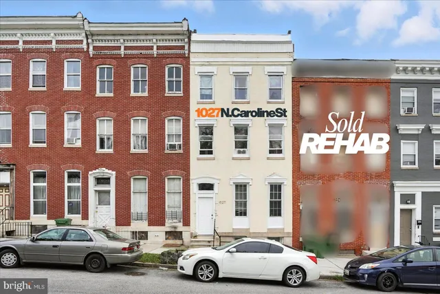 a car parked in front of a building