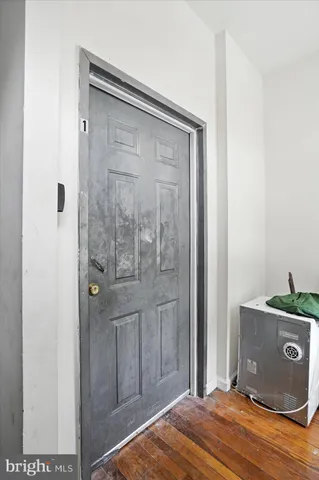 a view of a bathroom from a hallway