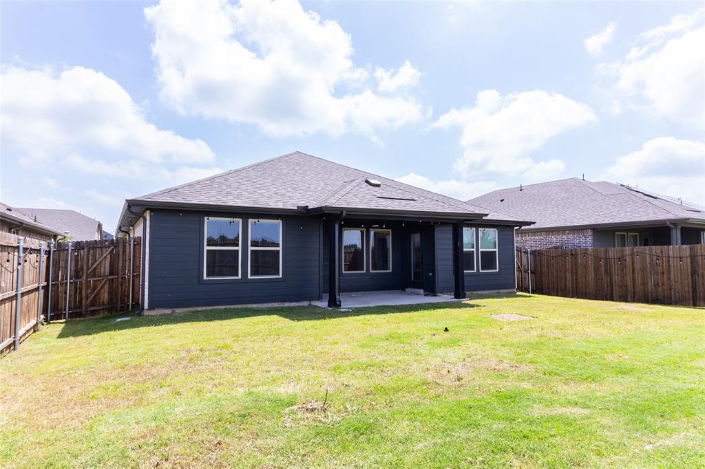 2604 Freeman Street Anna, TX 75409 - Photo 17 of 18 a front view of a house with a yard