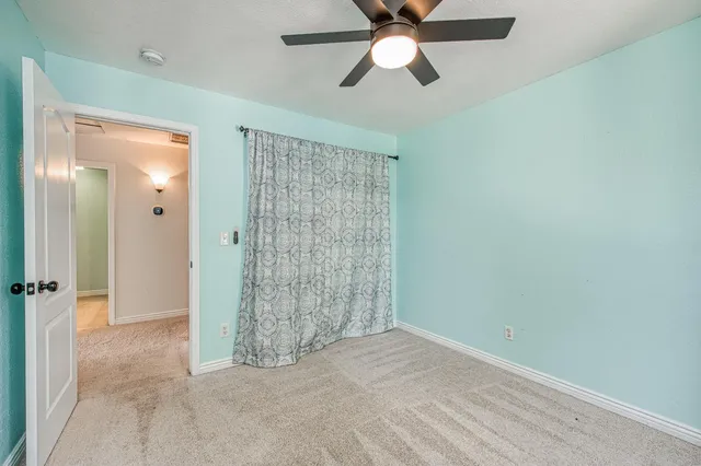 a bathroom with a sink vanity and a mirror