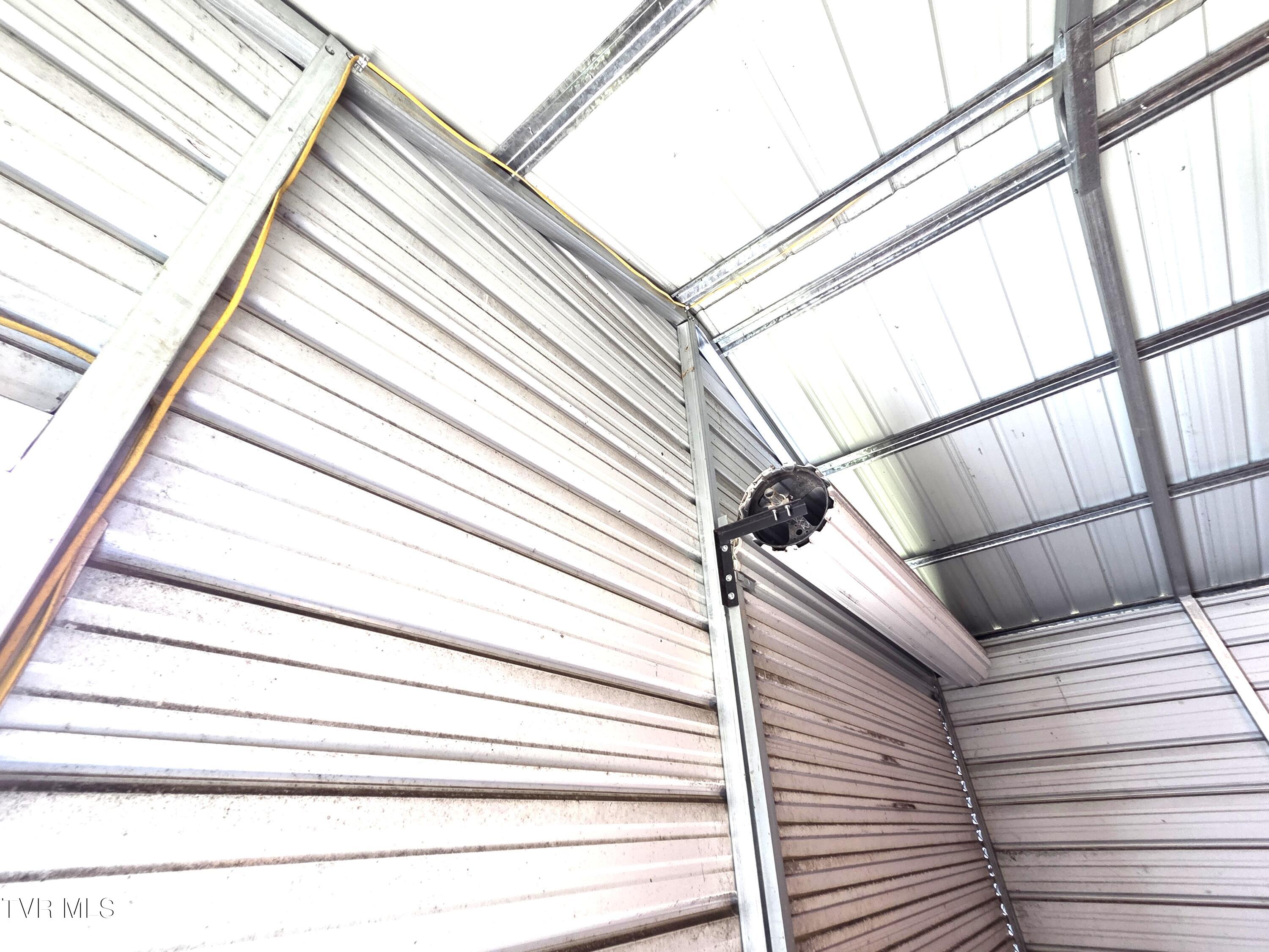 1401 Garden Road Elizabethton, TN 37643 - Photo 4 of 37 02 Garage storage Roll up door