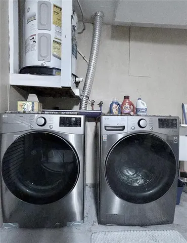 a utility room with a washer and dryer