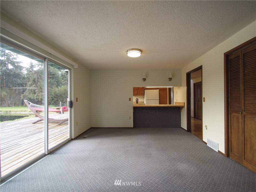 103 Rondale Drive Sequim, WA 98382 - Photo 13 of 35 an empty room with windows